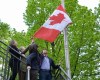 Deputy Prime Minister Chrystia Freeland, Foreign Affairs Minister Melanie Joly, Canada's ambassador to Ukraine Larisa Galadza and Prime Minister Justin Trudeau raise the flag over the Canadian embassy in Kyiv, Ukraine on Sunday May 8, 2022. Canada's embassy in Kyiv in an unannounced visit to Ukraine, where he met Ukrainian President Volodymyr Zelenskyy in person for the first time since Russia began its invasion in late February. THE CANADIAN PRESS/CBC News/Pool/Murray Brewster