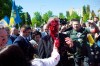 Russian Ambassador to Poland, Ambassador Sergey Andreev is covered with red paint in Warsaw, Poland, Monday, May 9, 2022. Protesters have thrown red paint on the Russian ambassador as he arrived at a cemetery in Warsaw to pay respects to Red Army soldiers who died during World War II. Ambassador Sergey Andreev arrived at the Soviet soldiers cemetery on Monday to lay flowers where a group of activists opposed to Russia’s war in Ukraine were waiting for him. (AP Photo/Maciek Luczniewski)