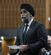 International Development Minister and Pacific Economic Development Agency of Canada Minister Harjit Sajjan rises during Question Period, Monday, April 4, 2022 in Ottawa. International Development Minister Harjit Sajjan says Canada is giving $229 million in aid for Syria and its neighbours this year. THE CANADIAN PRESS/Adrian Wyld