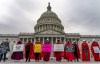 Abortion-rights protesters display placards during a demonstration outside the U.S. Capitol, Sunday, May 8, 2022, in Washington. As the United States faces turmoil over the possible overturning of the right to have an abortion, a new poll offers a picture of how Canadians feel about the issue. THE CANADIAN PRESS/AP-Gemunu Amarasinghe