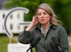 Melanie Joly, Foreign Minister of Canada, addresses the media during a statement as part of the meeting of foreign ministers of the G7 Group of leading democratic economic powers at the Weissenhaus resort in Weissenhaeuser Strand, Germany, Saturday, May 14, 2022. Foreign Minister Melanie Joly says Canada is prepared to send ships to help Ukraine export its wheat to the developing world. (Marcus Brandt/Pool via AP)