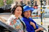 Finland's President Sauli Niinisto's wife Jenni Haukio, left, sits next to Sweden's Queen Silvia as they ride in a horse carriage in central Stockholm, Tuesday, May 17, 2022. Finland's President Niiniste and his wife are on a two-day long state visit to Sweden (Anders Wiklund/TT News Agency via AP)