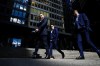 A group of men walk past the Toronto-Dominion Centre on Wellington Street in the financial district in Toronto on Wednesday, September 29, 2021. THE CANADIAN PRESS/Evan Buhler