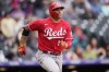 Cincinnati Reds' Joey Votto heads up the first base line as he lines out for the final out in the ninth inning of a baseball game against the Colorado Rockies, Sunday, May 1, 2022, in Denver. THE CANADIAN PRESS/AP-David Zalubowski