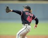 FILE - Colorado Silver Bullets pitcher Lee Ann Ketcham opens for her team against the men's Senior Baseball League Team in Atlanta-Fulton County Stadium in Atlanta, Sept. 3, 1994. The Silver Bullets, a professional women's baseball team, lost their season closer 9-6. (AP Photo/Andrew Innerarity, File)