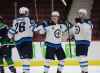 Blake Wheeler, Mark Scheifele celebrate with Pierre Luc Dubois after Dubois scored his first goal with the Winnipeg Jets during second period hockey action against the Vancouver Canucks in Vancouver, Sunday, February 21, 2021. (Trevor Hagan / Winnipeg Free Press)