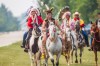 Horseback riders arrive to mark the 150th anniversary of Treaty No. 1 at Lower Fort Garry National Historic Site Tuesday. Representatives from the seven Treaty 1 First Nations, Treaty Relations Commission of Manitoba, government officials and treaty allies gathered at the historic site. (Mikaela MacKenzie / Winnipeg Free Press)