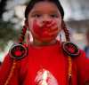 JOHN WOODS / WINNIPEG FREE PRESS
Anastasia, 5, sister of Eishia Hudson, holds a candle as people gather for a vigil at the Murdered and Missing Women and Girls (MMIWG) monument at the Forks, Monday.