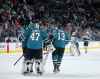 San Jose Sharks' congratulate goaltender James Reimer (47) after defeating the Winnipeg Jets' during NHL hockey action in San Jose, California,, Saturday, October 30, 2021. (Trevor Hagan / Winnipeg Free Press)