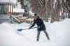 MIKAELA MACKENZIE / WINNIPEG FREE PRESS



Kristen Schmidt shovels her sidewalk in the West End after a big snowfall in Winnipeg on Tuesday, Jan. 18, 2022. Standup.

Winnipeg Free Press 2022.