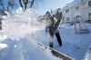 JOHN WOODS / WINNIPEG FREE PRESS
Maeve Hemmerling clears snow from the neighbourhood rink in Crescentwood on Sunday. (JOHN WOODS / WINNIPEG FREE PRESS)