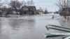 In this screen grab, the banks of Deadhorse Creek in the city of Morden spilled over Saturday morning, April 30, 2022. The southern Manitoba community is one of several areas that have been among the hardest hit with another Colorado low system that brought more rain starting Friday night. (Supplied)