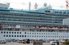 The cruise ship Diamond Princess is anchored at the Yokohama Port in Yokohama, near Tokyo Friday, Feb. 7, 2020. Japan on Friday reported 41 new cases of a virus on a cruise ship that's been quarantined in Yokohama harbor while the death toll in mainland China rose to 636, including a doctor who got in trouble with authorities in the communist country for sounding an early warning about the disease threat. (AP Photo/Eugene Hoshiko)