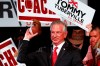 Republican Senator-elect Tommy Tuberville throws toy footballs to supporters at his watch party at the Renaissance Hotel on Tuesday, Nov. 3, 2020, in Montgomery, Ala. (AP Photo/Butch Dill)