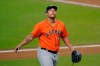 Houston Astros pitcher Andre Scrubb walks off after being relieved during the seventh inning in Game 6 of a baseball American League Championship Series against the Tampa Bay Rays, Friday, Oct. 16, 2020, in San Diego. (AP Photo/Gregory Bull)