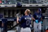 Tampa Bay Rays' Austin Meadows tosses his helmet after flying out during the ninth inning in Game 5 of a baseball American League Championship Series against the Houston Astros, Thursday, Oct. 15, 2020, in San Diego. (AP Photo/Jae C. Hong)