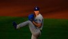 Los Angeles Dodgers starting pitcher Walker Buehler throws to the Los Angeles Angels during the first inning of a baseball game Saturday, Aug. 15, 2020, in Anaheim, Calif. (AP Photo/Marcio Jose Sanchez)