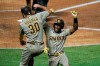 San Diego Padres' Jurickson Profar, right, celebrates his two-run home run with Eric Hosmer during the fourth inning of a baseball game against the Los Angeles Angels, Wednesday, Sept. 2, 2020, in Anaheim, Calif. (AP Photo/Jae C. Hong)