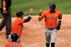 Houston Astros' Carlos Correa, right, and Yuli Gurriel celebrate after they scored on a single hit by Martin Maldonado during the seventh inning of the first baseball game of a doubleheader against the Los Angeles Angels, Saturday, Sept. 5, 2020, in Anaheim, Calif. (AP Photo/Jae C. Hong)