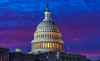 In shades of red and blue, dawn arrives on Capitol Hill in Washington, Friday, Nov. 6, 2020. (AP Photo/J. Scott Applewhite)