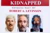 FILE - In this March 6, 2012, file photo, an FBI poster showing a composite image of former FBI agent Robert Levinson, right, of how he would look like now after five years in captivity, and an image, center, taken from the video, released by his kidnappers, and a picture before he was kidnapped, left, displayed during a news conference in Washington. A U.S. judge ordered Iran on Thursday, Oct. 1, 2020, to pay $1.45 billion to Levinson's family, who is believed to have been kidnapped by the Islamic Republic while on an unauthorized CIA mission to an Iranian island in 2007. (AP Photo/Manuel Balce Ceneta, File)