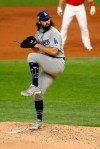 Los Angeles Dodgers starting pitcher Tony Gonsolin throws during the third inning of a baseball game against the Los Angeles Dodgers in Arlington, Texas, Sunday, Aug. 30, 2020. (AP Photo/Roger Steinman)