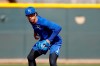 Kansas City Royals shortstop Adalberto Mondesi fields a ball during spring training baseball practice Wednesday, Feb. 12, 2020, in Surprise, Ariz. (AP Photo/Charlie Riedel)