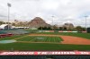 A grounds crew member applies fertilizer to the field as players report for spring training baseball, Tuesday, Feb. 11, 2020, in Tempe, Ariz. Los Angeles Angels pitchers and catchers start practice on Wednesday. (AP Photo/Darron Cummings)