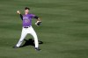 Colorado Rockies' Ubaldo Jimenez throws during spring training baseball practice, Saturday, Feb. 15, 2020, in Scottsdale, Ariz. (AP Photo/Darron Cummings)