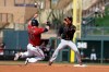 Arizona Diamondbacks' Kole Calhoun is tagged out at second as San Francisco Giants' Abiatal Avelino waits for the throw during the second inning of a spring training baseball game, Monday, March 2, 2020, in Scottsdale, Ariz.(AP Photo/Darron Cummings)