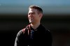 Chicago Cubs president of baseball operations Theo Epstein looks on during a spring training baseball workout Wednesday, Feb. 12, 2020, in Mesa, Ariz. (AP Photo/Gregory Bull)