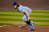 Los Angeles Dodgers starting pitcher Dustin May gets up after taking a line drive to the foot off the bat of Arizona Diamondbacks' Josh Rojas during the first inning of a baseball game, Thursday, Sept. 10, 2020, in Phoenix. (AP Photo/Matt York)