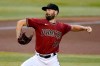 Arizona Diamondbacks starting pitcher Robbie Ray throws against the Colorado Rockies during the first inning of a baseball game, Wednesday, Aug. 26, 2020, in Phoenix. (AP Photo/Matt York)