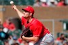 Cincinnati Reds pitcher Trevor Bauer throws against the Arizona Diamondbacks during the first inning of a spring training baseball game, Thursday, Feb. 27, 2020, in Scottsdale Ariz. (AP Photo/Matt York)