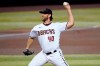 Arizona Diamondbacks starting pitcher Madison Bumgarner (40) throws against the Los Angeles Dodgers during the first inning of a baseball game, Thursday, Sept. 10, 2020, in Phoenix. (AP Photo/Matt York)