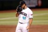 Arizona Diamondbacks starting pitcher Madison Bumgarner (40) looks away in between pitches against the Houston Astros during the third inning of a baseball game Tuesday, Aug. 4, 2020, in Phoenix. (AP Photo/Matt York)