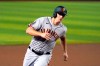 San Francisco Giants' Alex Dickerson scores a run against the Arizona Diamondbacks in the first inning on a ball hit by Evan Longoria during a baseball game, Saturday, Aug 29, 2020, in Phoenix. (AP Photo/Rick Scuteri)