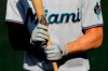 Miami Marlins' Matt Joyce holds a bat while standing at the on deck circle during the second inning in game one of a baseball double-header against the Baltimore Orioles, Wednesday, Aug. 5, 2020, in Baltimore. (AP Photo/Julio Cortez)
