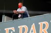 Washington Nationals general manager Mike Rizzo looks on during the seventh inning in the continuation of a suspended baseball game between the Baltimore Orioles and the Nationals, Friday, Aug. 14, 2020, in Baltimore. The first part of the game was suspended on Aug. 9, when the groundskeepers had technical difficulties with the infield tarp in the sixth inning during a rain delay, causing the infield to become too wet and muddy to play. (AP Photo/Julio Cortez)