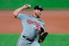 Washington Nationals starting pitcher Stephen Strasburg throws a pitch to the Baltimore Orioles during the first inning of a baseball game, Friday, Aug. 14, 2020, in Baltimore. (AP Photo/Julio Cortez)