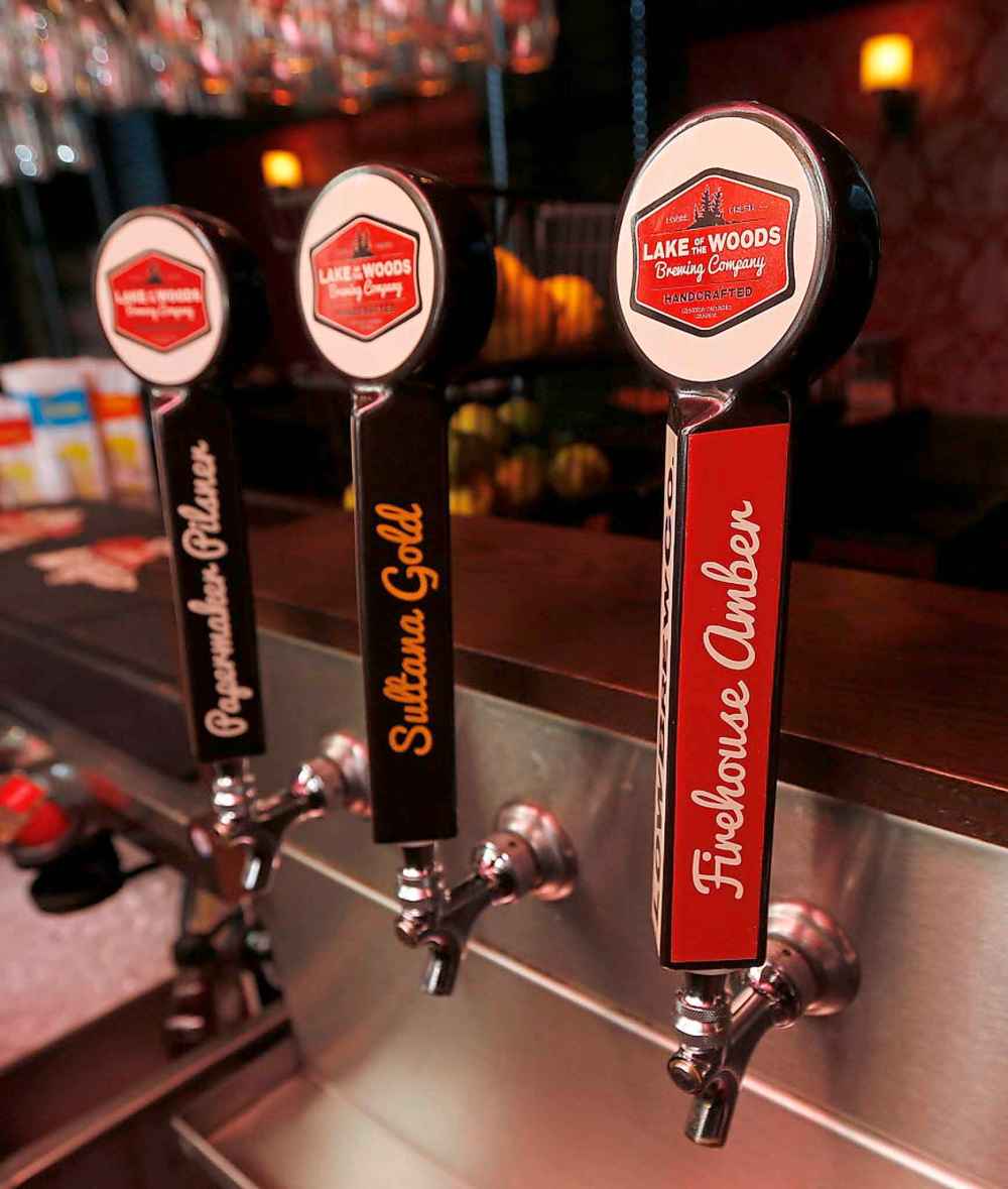 KEN GIGLIOTTI / WINNIPEG FREE PRESS FILES
Lake Of The Woods Brewing Co.'s ground-level tap room and patio in True North Square are now open.