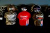 FILE - In this Jan. 8, 2020, file photo, a display of President Trump baseball caps at the Bedford Trump Train headquarters in Temperance, Mich. The coronavirus pandemic isn't going away anytime soon, but campaigns are still forging ahead with in-person organizing. The pandemic upended elections this year, forcing campaigns to shift their organizing activities almost entirely online and compelling both parties to reconfigure their conventions. (AP Photo/Carlos Osorio, File)