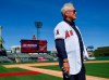 FILE - In this Oct. 24, 2019, file photo, Los Angeles Angels manager Joe Maddon chats with visitors to a news conference introducing him as manager of the baseball team, at Angel Stadium in Anaheim, Calif. When spring training opens next week in Arizona, Maddon believes he will be working with the pieces of a contender. (Jeff Gritchen/The Orange County Register via AP, File)