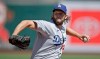 Los Angeles Dodgers' pitcher Clayton Kershaw works against the San Francisco Giants in the first inning of the first game of a baseball doubleheader Thursday, Aug. 27, 2020, in San Francisco. (AP Photo/Ben Margot)