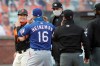 San Francisco Giants' Tyler Heineman, left, smiles at his brother Texas Rangers' Scott Heineman (16) as they represent with umpires prior to a baseball game Saturday, Aug. 1, 2020, in San Francisco. (AP Photo/Ben Margot)