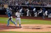 Tampa Bay Rays catcher Michael Perez, left, celebrates after New York Yankees' Gio Urshela flied out for the final out in Game 5 of a baseball AL Division Series, Friday, Oct. 9, 2020, in San Diego. Tampa Bay won 2-1 to advance to the AL Championship Series. (AP Photo/Gregory Bull)