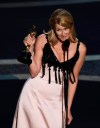 Laura Dern accepts the award for best performance by an actress in a supporting role for 