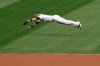 Oakland Athletics' Tommy La Stella catches a line drive by Houston Astros' Kyle Tucker during the second inning of the first baseball game of a doubleheader in Oakland, Calif., Tuesday, Sept. 8, 2020. (AP Photo/Jed Jacobsohn)