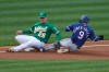 Oakland Athletics third baseman Matt Chapman tags out Isiah Kiner-Falefa of the Texas Rangers on an attempted steal during the third inning of a baseball game in Oakland, Calif., Tuesday, Aug. 4, 2020. (AP Photo/Jed Jacobsohn)