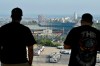 Los Angeles Dodgers fans take in the view near Dodger Stadium on Wednesday, June 24, 2020, in Los Angeles. By the time Major League Baseball returns in late July, it will have been more than four months since teams last played. The season is now going to be a 60-game sprint to the finish, held in ballparks without fans and featuring some unusual rules. (AP Photo/Mark J. Terrill)